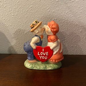 Vintage ceramic kissing pigs